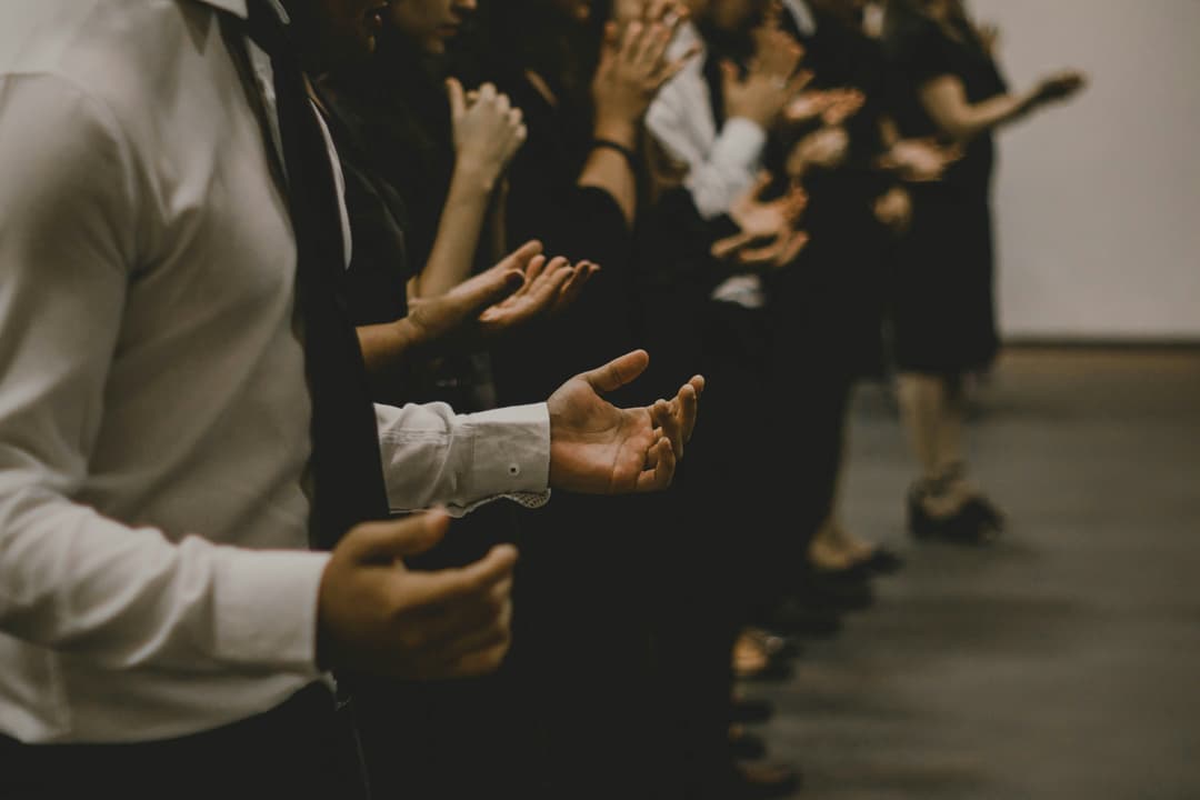 Hands held out in church